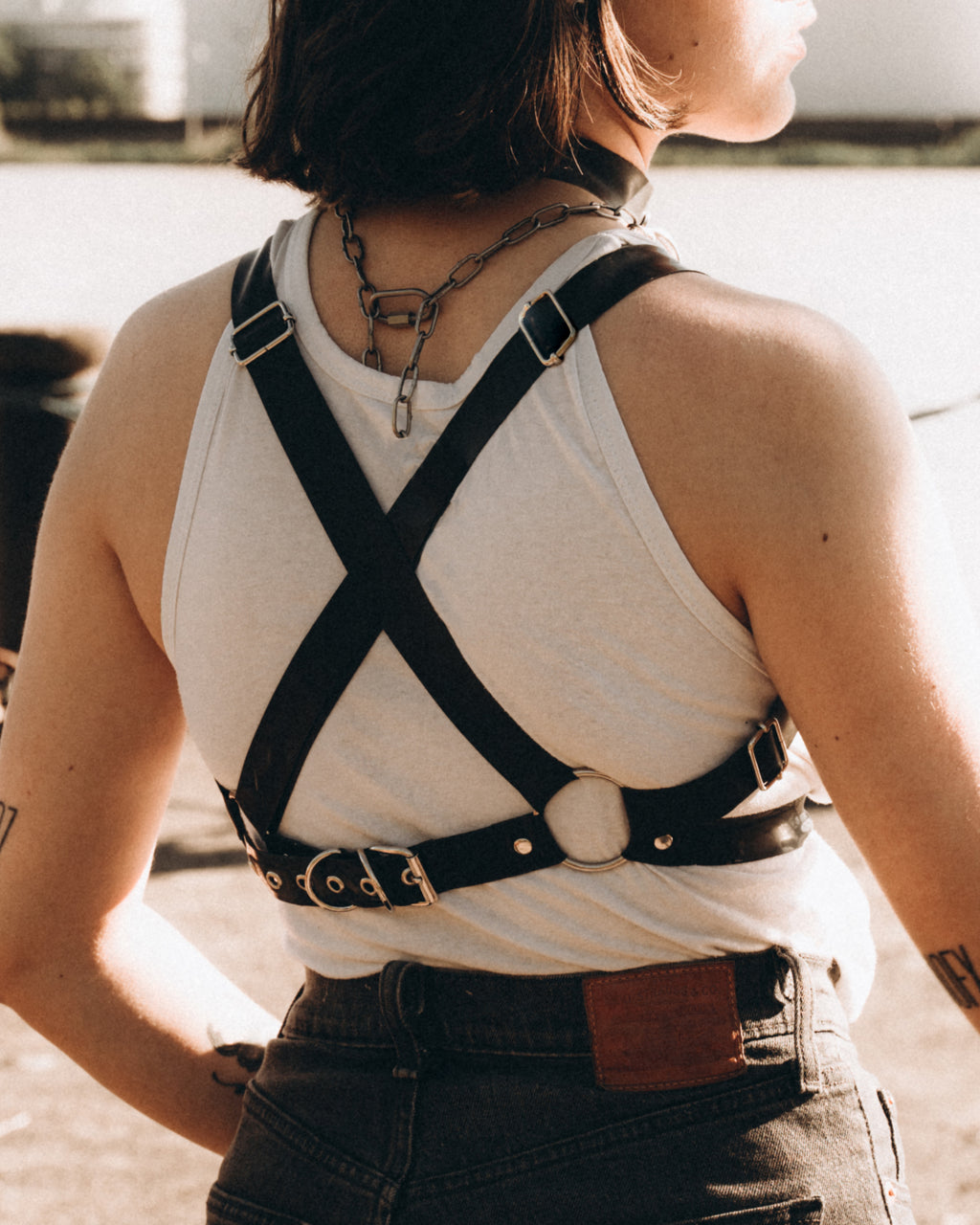 Harnais poitrine triangle en latex unisexe